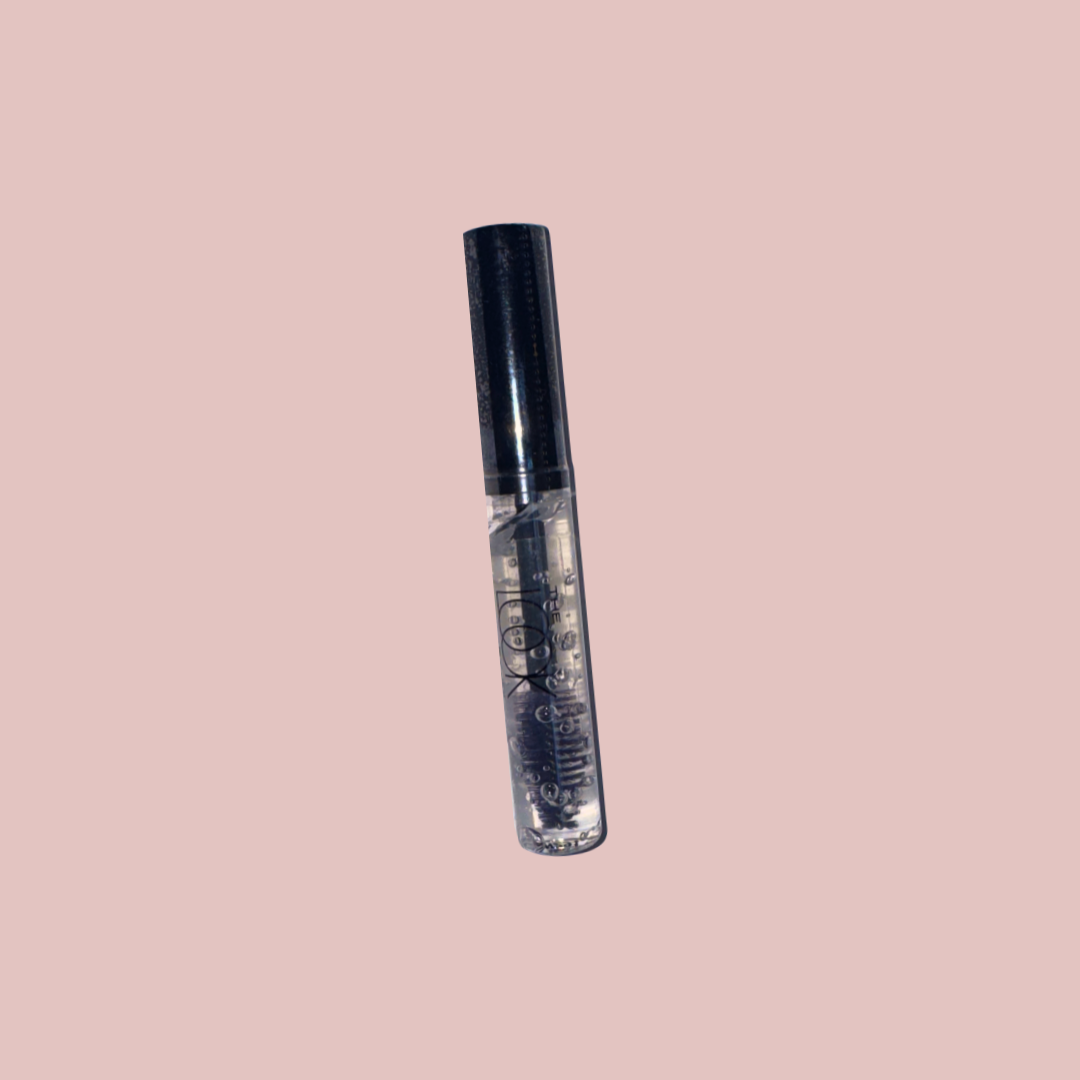 A tube of Brow Fix Gel with a precision brush applicator, predominantly clear in color.
